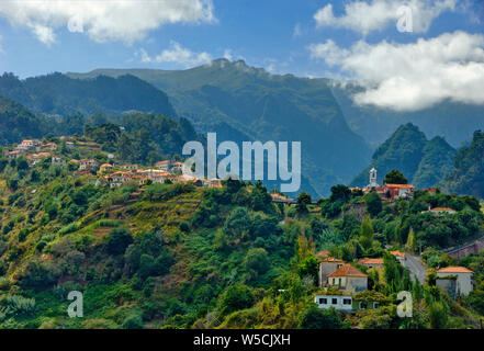 Portugal, Madeira, Sao Roque do Faial village and the Caldeirao with Pico Ruivo in the distance Stock Photo