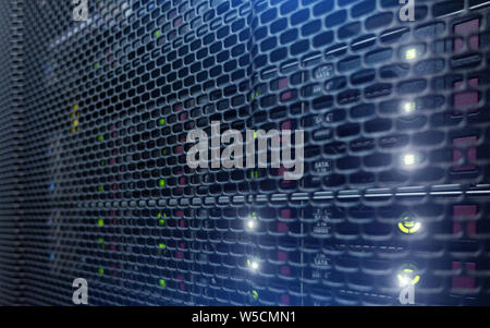Row of hard drives mounted in a rack in a data center. SATA HDD DISK. Stock Photo