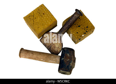 cut bricks and brick cutting tools isolated on a white background. Stock Photo