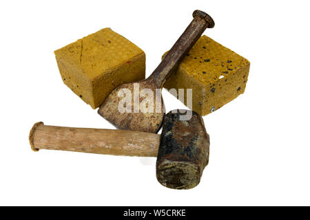 cut bricks and brick cutting tools isolated on a white background. Stock Photo