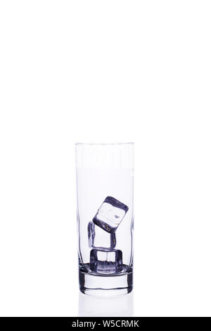 Empty glass cup for cocktail ice cubes on a white background isolate. Stock Photo