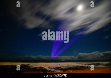 Bunbury Lighthouse at Night Back lit with Stars and Moon Sky Western Australia Stock Photo