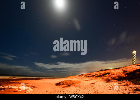 Bunbury Lighthouse at Night with Stars and Moon Sky Western Australia Stock Photo