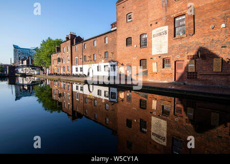 Reflections in the water on a sunny summer morning at the Gas Street Basin, Birmingham West Midlands England UK Stock Photo