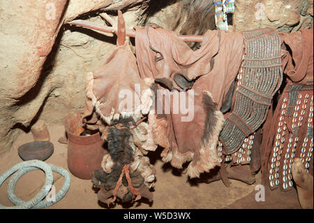 Interior of a Himba hut woman cooks food, Kaokoveld, Namibia, Africa Stock Photo
