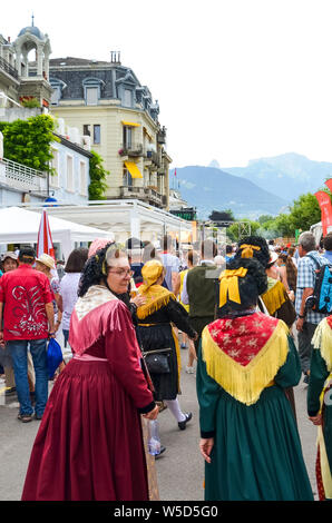 Vevey, Switzerland - July 26 2019: People in costumes celebrate Fete des Vignerons 2019. Traditional festival pays homage to viticultural traditions in Lavaux wine region. Organized once in 20-25 years, once in a generation, since 18th century. It was honoured as the first living tradition in Switzerland to received UNESCO recognition. Festival takes place from 18th July till 11th August 2019. Stock Photo