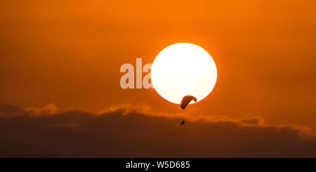 Paragliding during sunset in Nicosia, Cyprus Stock Photo
