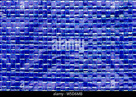 Texture of blue plastic net bag. Concept of recycle product or global warming. Stock Photo