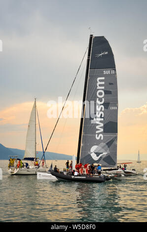 Vevey, Switzerland - July 26 2019: People on sailboats celebrate Fete des Vignerons 2019. Traditional festival pays homage to viticultural traditions in Lavaux wine region. Organized once in 20-25 years, since 18th century. It was honoured as the first living tradition in Switzerland to received UNESCO recognition. Festival takes place from 18th July till 11th August 2019. Stock Photo