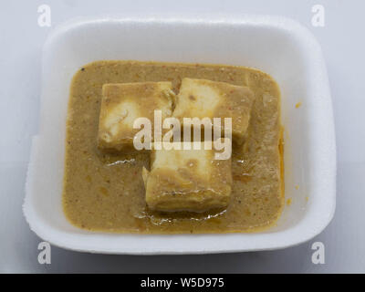 Paneer Butter Masala is soft pieces of Paneer in a rich, creamy and aromatic gravy made of butter, onions & tomatoes Stock Photo