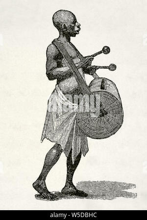 Central Africa. Man in a caravan playing a kettledrum. Engraving. Africa inexplorada, el Continente Misterioso by Henry Morton Stanley, c. 1887. Stock Photo