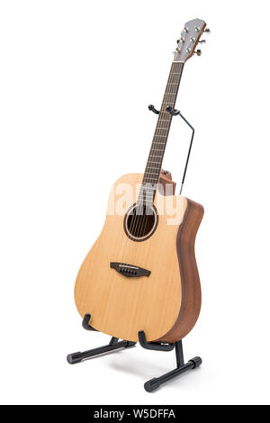 acoustic guitar with stand isolated on white background Stock Photo