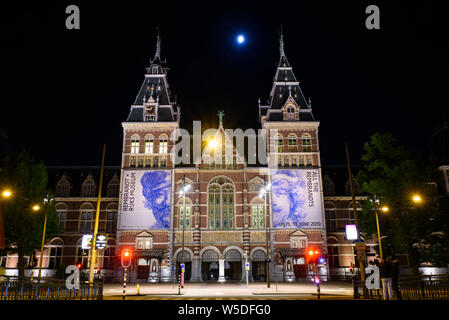 Night view of Rijksmuseum, the national museum of arts and history at the Museum Square in Amsterdam, Netherlands Stock Photo