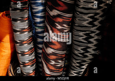 Rolls of hand woven T'nalak cloth, made from organic Abaca plant fibers. Plant based textile. Animal free product. Selective focus. Stock Photo