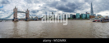 A panoramic view of the London skyline taken from by the Tower of London including Tower Bridge and the Shard Stock Photo