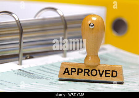 approved printed on rubber stamp in office Stock Photo
