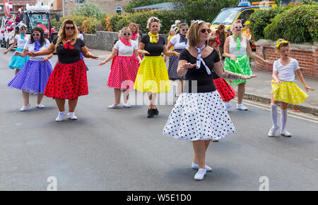 Swanage, Dorset, UK. 28th July, 2019. Thousands flock to Swanage Carnival to see the procession parade on the theme of Swanage Goes Musical on a warm sunny day. Credit: Carolyn Jenkins/Alamy Live News Stock Photo