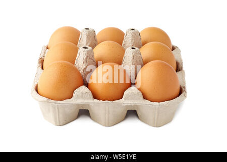 Brown fresh eggs in retail tray on white Stock Photo