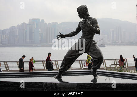 Statue of martial artist Bruce Lee on Avenue of Stars in Tsim Tsa Tsui, Hong Kong Stock Photo