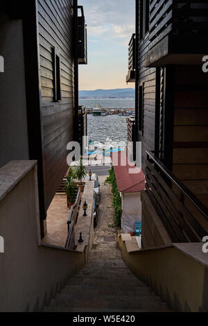 NESSEBAR, BULGARIA - JUNE 22, 2019: Narrow streets of the old seaside town. Early morning. Stock Photo