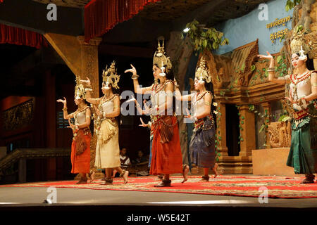 SIEM REAP, CAMBODIA - FEB 14, 2015 - Solo Apsara dancer uses hand gestures to tell a story,  Siem Reap,  Cambodia Stock Photo