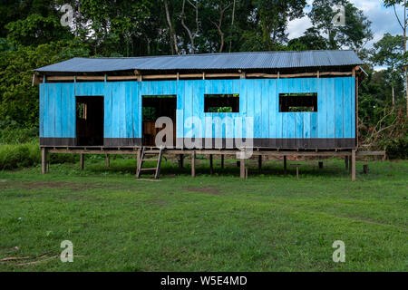 One-room schoolhouse on stilts on Warmi Isla on the Peruvian Amazon River Stock Photo