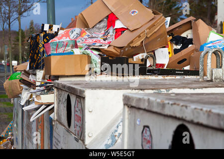 overfull paper container Stock Photo