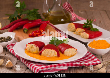 Stuffed piquillo peppers with cod. Stock Photo