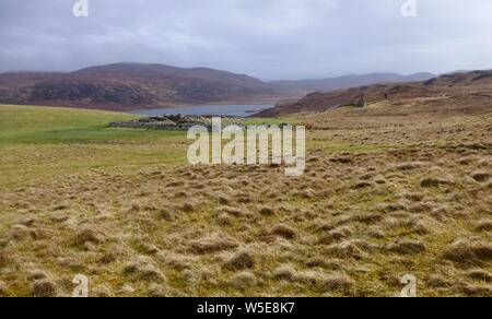 Sandwood Bay, Sutherland coast of NW Scotland. Known for its remote 1 mile long beach, near Cape Wrath. Beyond the large dunes lies a freshwater loch. Stock Photo