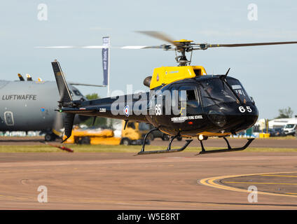 DHFS Eurocopter AS350BB Squirrel HT1 helicopter hover taxiing at Royal International Air Tattoo at RAF Fairford, UK. Defence Helicopter Flying School Stock Photo