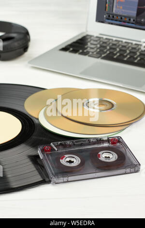 Vinyl record, compact disc and cassette. Stock Photo
