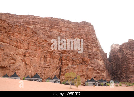 Traditional goat hair bedouin tents in a camp in Wadi Rum, Jordan. Stock Photo