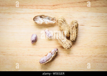 Peanut on wood background / Boiled peanuts peeled Stock Photo