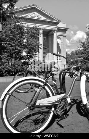 Bicycles on a rack before the Fulton Chapel, a venue for the performing arts, on the campus of Ole Miss, University of Mississippi, Oxford, MS Stock Photo