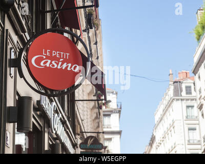 LYON, FRANCE - JULY 19, 2019: Petit Casino logo in front of their local supermarket in Lyon. Casino Supermarche is a French retailer of supermarkets a Stock Photo