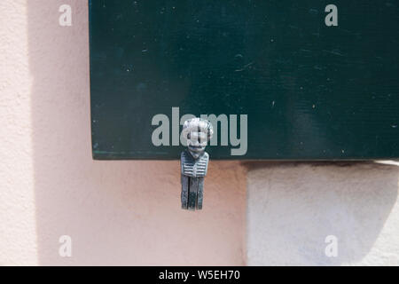 Close up detail shot of old window shutters on buildings in Murano , Venice.A island famous for its glass making. Stock Photo
