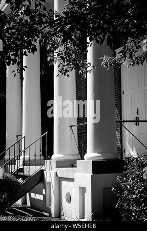 Close up of an entrance to antebellum brick building with columns in a Greek revival style on campus of Ole Miss, University of Mississippi, Oxford Stock Photo