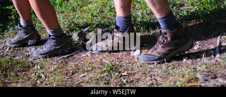 Pair of Hiking Boots on Dirt Trail In Colorado Stock Photo