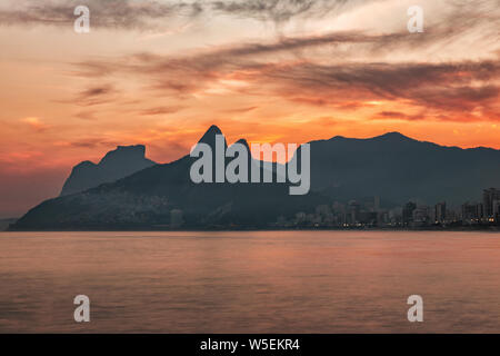 Cloudy full moon on Sugarloaf Stock Photo