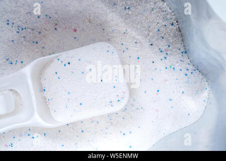 Laundry Detergent Or Washing Powder In Blue Measuring Cup Stock Photo -  Download Image Now - iStock