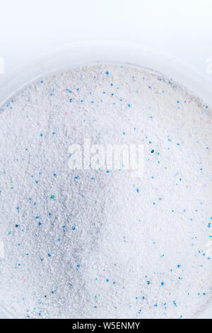 Blue plastic washing powder measuring cup isolated on white Stock Photo -  Alamy