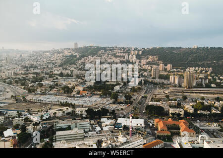 Aerial View of Haifa city, Israel. Scenic panorama of metropolian area of Haifa. City located on Mount Carmel, view on a sunny fine day. Architecture Stock Photo