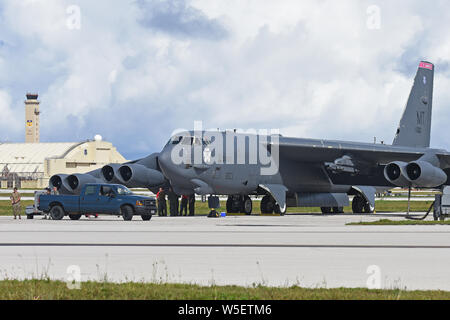 A B-52 Stratofortress from the 69th Expeditionary Bomb Squadron, deployed from Minot Air Force Base, N.D., lands July 12, 2019, at Andersen Air Force Base, Guam. A new rotation of aircrews, maintenance personnel and aircraft assigned to the 69th EBS arrived on Guam to replace the 23rd EBS in support of the U.S. Pacific Command’s continuous bomber presence mission. Since March 2004, Andersen AFB has hosted the CBP mission, which is designed to enhance regional security and provides reassurance to allies and partners that the United States is capable of defending its national security interests Stock Photo