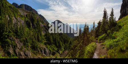 Beautiful Panoramic view of Canadian Mountain Landscape during a vibrant summer day. Taken at Mt Arrowsmith, near Nanaimo, Vancouver Island, BC, Canad Stock Photo