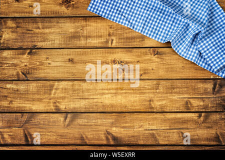Top view of wooden brown background with blue tussue Stock Photo