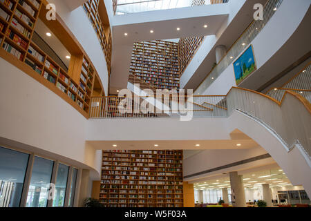 Interior view of the library of the Chinese University of Hong Kong, Shenzhen, abbreviated as CUHK-Shenzhen, in Shenzhen city, south China's Guangdong Stock Photo