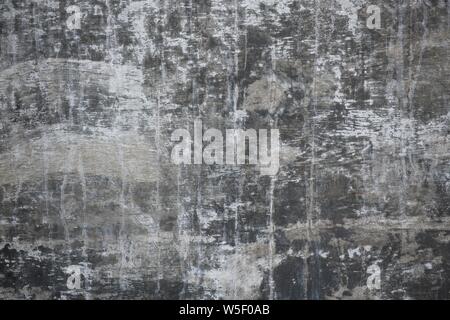 Grey grungy weathered wall background or wallpaper Stock Photo