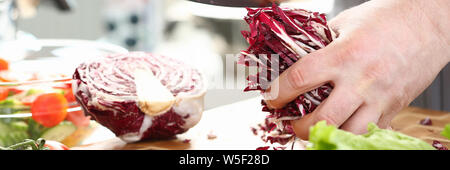 Male Chef Holding Sliced Chopped Purple Cabbage Stock Photo