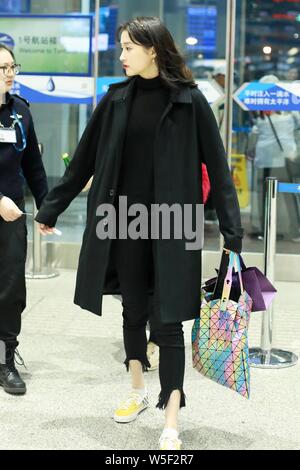 Chinese actress Guan Xiaotong arrives at the Shanghai Hongqiao ...