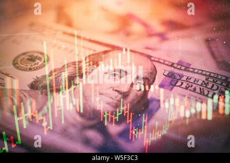 Close up of abstract business chart bars and arrows on dark background with binary code. Stock Photo